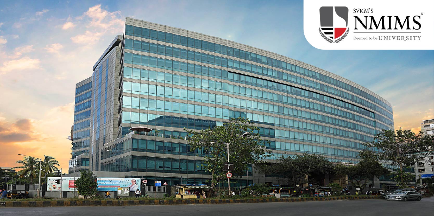 NMIMS Building is shown in he image along with logo on the right top corner.